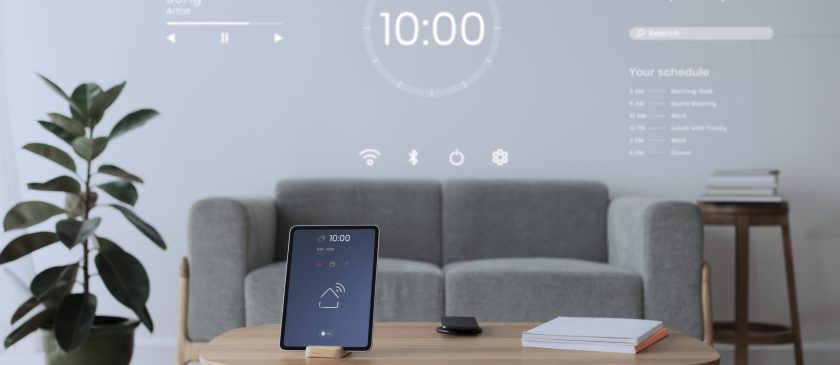 Digital tablet screen with smart home controller on a wooden table